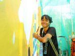 Seniman-mural-dan-ilustrator-Bali-Yessiow-tampil-di-Saladina-Festival.jpg