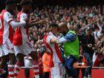 gelandang-arsenal-asal-swiss-granit-xhaka-tengah-melakukan-selebrasi.jpg