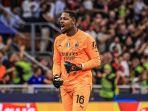 kiper-ac-milan-mike-maignan-dikabarkan-bakal-menepi-satu-bulan.jpg