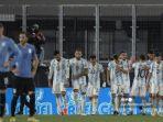 para-pemain-argentina-merayakan-setelah-mencetak-gol-kedua-melawan-uruguay.jpg