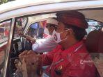 pasangan-jaya-wibawa-saat-mendaftar-ke-kpu-kota-denpasar.jpg