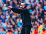 pelatih-manchester-city-pep-guardiola-melakukan-selebrasi-usai-timnya-menang-atas-liverpool.jpg