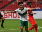 pemain-timnas-indonesia-witan-sulaeman-merayakan-golnya-pada-pertandingan-vs-singapura-di-aff-2020.jpg
