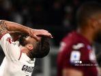 reaksi-penyerang-ac-milan-prancis-olivier-giroud-selama-pertandingan-sepak-bola-serie-a-italia.jpg