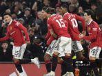 striker-manchester-united-jadon-sancho-kiri-merayakan-setelah-mencetak-gol-kedua.jpg