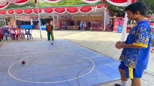 20250926-LOMBA-GASING-Seorang-pelajar-Sekolah-Dasar-tengah-mengikuti.jpg