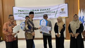 bangka/Penerima-rumah-layak-huni-dari-Baznas.jpg