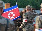 20220604-petugas-medis-militer-tentara-rakyat-korea-menyelesaikan-krisis-covid-19-di-pyongyang.jpg
