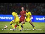 20230511_Pemain-Malaysia-U22-saat-berebut-bola-dengan-pemain-Vietnam-U22.jpg