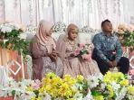 20230812-Pengantin-wanita-ditemani-orang-tua-di-pelaminan.jpg