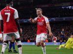 20231130-arsenal-lolos-16-besar-liga-champions.jpg