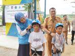 20240911-General-Manager-PLN-UIW-Babel-Dini-Sulistyawati-Paling-kiri-1.jpg<pf>20240911-Simbolis-penyerahan-Bantuan-TJSL-PLN-dari-GM-PLN-UIW-Babel.jpg