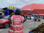 20250314-Ilustrasi-Juru-Parkir.jpg