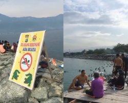 Sudah Dipasang Larangan Berenang Sebab Banyaknya Buaya, Warga Ngeyel Berendam di Pantai Teluk Palu