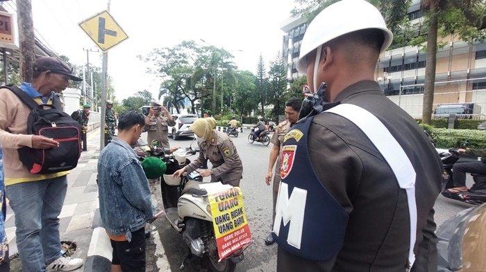 Ditertibkan Tim Gabungan, Pelaku Jasa Penukaran Uang di Banjarmasin Ini Sempat Tak Terima