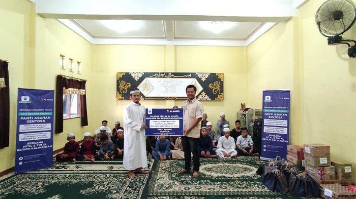 Sambut HUT ke-78 Kemerdekaan RI, MTXL Axiata Serahkan Santunan Anak Yatim Duafa di Banjarmasin