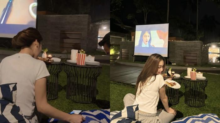 SESOSOK LELAKI TEREKAM - Momen pedangdut Ayu Ting Ting nonton film saat rayakan ulang tahun Umi Kalsum dicapture Jumat (14/11/2025). Penampakan jidat lelaki di foto tuai sorotan warganet.