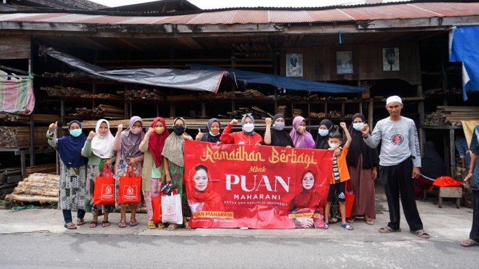 Reses di Banjarmasin, Anggota Komisi II DPR RI Hj Aida Muslimah Bagi Beras ke Warga Keramat Raya