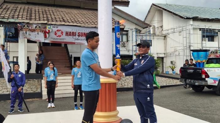 Semarak Warga Tanahlaut Sambut Api Obor Porprov XII, Dikirab Keliling Kota Pelaihari