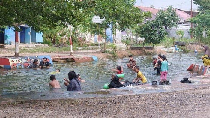Sediakan Suasana Sejuk & Teduh, Kolam Umum Kompleks Lambung Mangkurat Regency Cocok Untuk Bersantai
