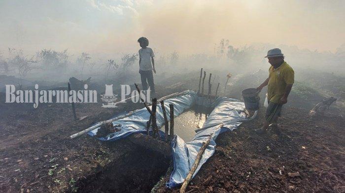 Karhutla Lalsel - Jaga Lahan agar Tidak Terbakar, Petani di Banjarbaru Ini Bikin Penampungan Air