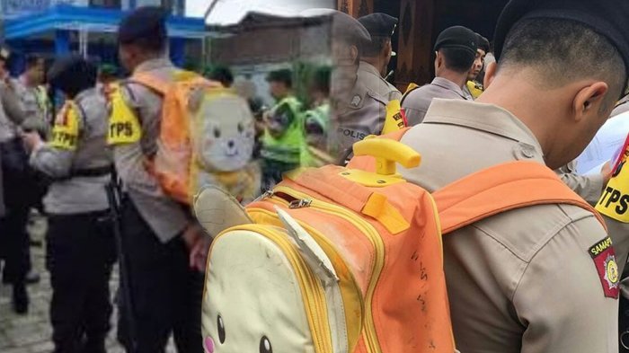 Bikin Haru, Polisi Ini Kenakan Tas Anak Ketika Apel Pilkada Serentak, Alasannya Ternyata Ini