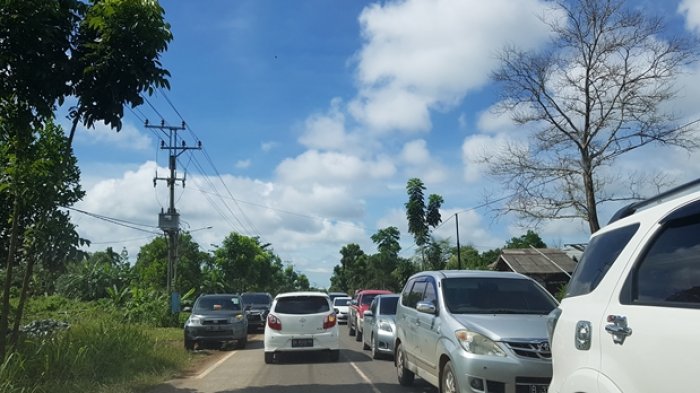 Pengepul Ikan Ini Resah Terjebak Dua Jam di Tambangulang