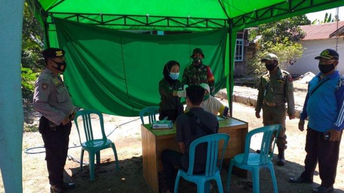 Satgas Covid-19 Kapuas Kuala Pastikan Warga Patuhi Protokol Kesehatan, Pengguna Jalan Cek Suhu Tubuh