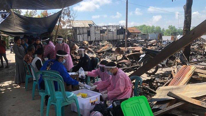 Bantu Korban Kebakaran di Pulau Bromo Banjarmasin, Tim Kesehatan Polda Kalsel Beri Pengobatan Gratis