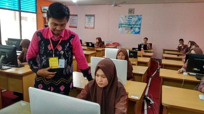 Virus Corona Semakin Merebak, Ikatan Guru Indonesia Minta UN 2020 Ditunda