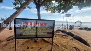 Ayunan-di-bibir-pantai-sambil-menikmati-hembusan122.jpg