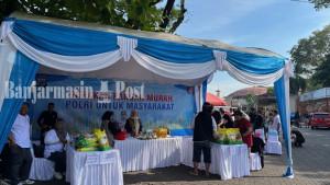 GERAKAN-PANGAN-MURAH-Ditreskrimsus-Polda-Kalsel-bersama-Bulog-Kalsel-mss.jpg