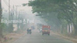 Kabut-asap-karhutla-di-Battibati-Kabupaten-Tanah-Laut-Tala-kalsel-Rabu-04102023.jpg