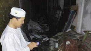 Kepala-MIN-6-Tapin-Mujtahidun-di-bagian-belakang-kelas-yang-terbakar-Senin-14082023.jpg