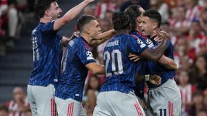 Pemain-Arsenal-merayakan-gol-dalam-laga-Liga-Champions.jpg