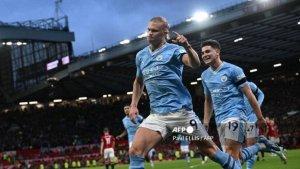 Striker-Manchester-City-Erling-Haaland-merayakan-setelah-mencetak-gol-pembuka-dari-titik-penalti.jpg