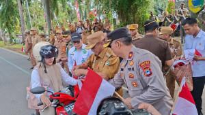WABUP-Tala-HM-Zazuli-bersama-Forkopimda-dan-jajaran-membagikan-bendera-merah-putih.jpg