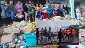 Warga-menyaksikan-upaya-pemadaman-api-yang-membakar1.jpg