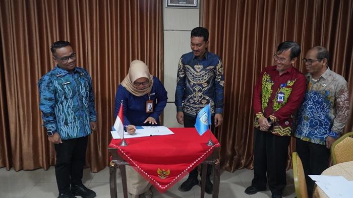 Dinkes-Banjar-melakukan-penandatanganan-kerja-sama-JKN.jpg