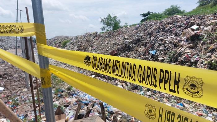 GARIS-MELINTAS-Ilustrasi-Garis-dilarang-melintas-terpasang-di-TPA-Basirih-Banjarmasin1.jpg