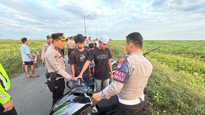 Aksi Balap Liar di Danau Panggang HSU Resahkan Warga, Poliisi Turun Lakukan Penertiban - Banjarmasinpost.co.id