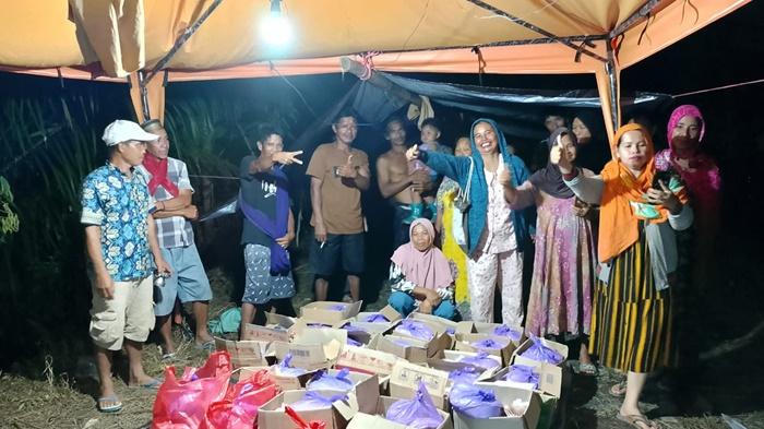 bantuan-logistik-ke-warga-terdampak-banjir-di-Tanah-Bumbu.jpg