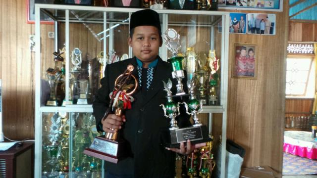 diusia-7-tahun-muhammad-rifae-sudah-menorehkan-prestasi_20150504_175155.jpg