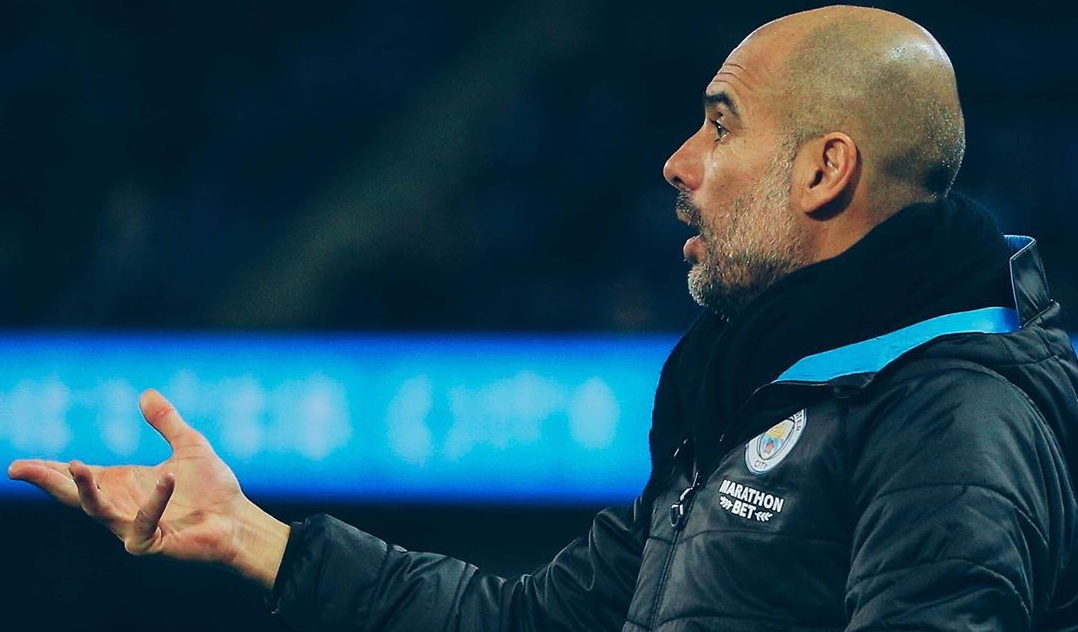 foto-pelatih-manchester-city-pep-guardiola.jpg