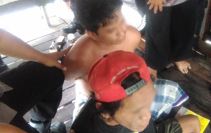 hasbi-31-dan-jujun-28-saat-diamankan-aparat-gabungan.jpg