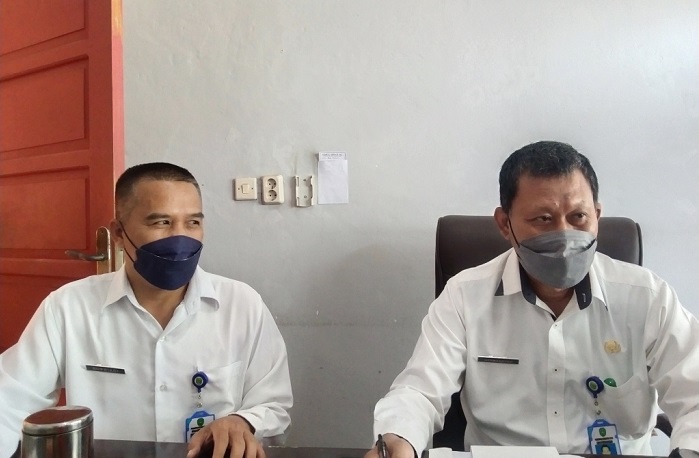 plt-kepala-dinas-perdagangan-tapin-hermansyah-kanan.jpg