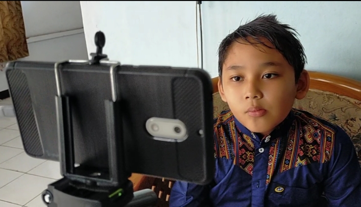 rama-anak-sd-kelas-5-mengerjakan-tugas-belajar-online.jpg