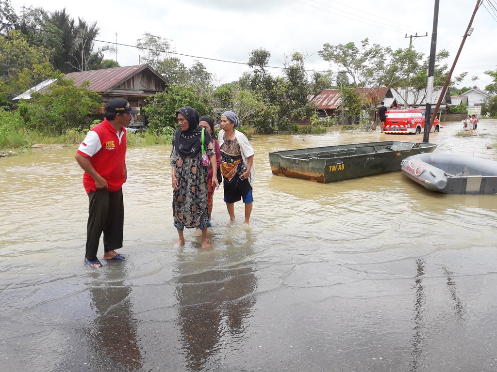 ratusan-rumah-terendam-di-tapin-utara_20170307_131427.jpg