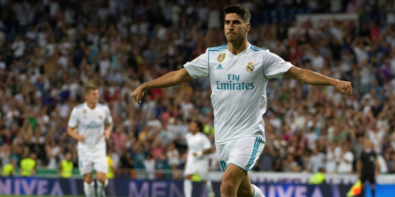 real-madrid-marco-asensio-merayakan-gol-yang-dia-cetak-ke-gawang-valencia_20170923_081136.jpg