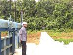 20210205helriansyah-humas-pdam-kotabaru-syarwan-cekan-embung-tirawan.jpg